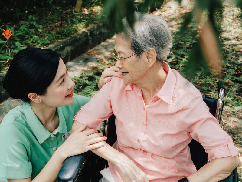 Caregiver sharing a moment with resident