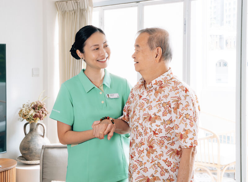 ECON Healthcare caretaker with a resident